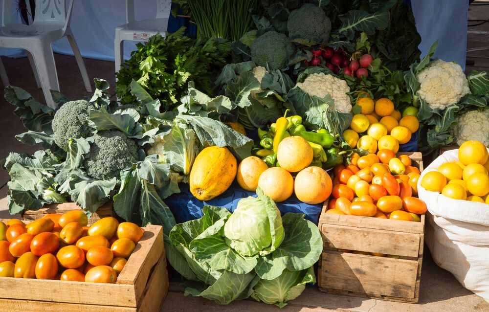 Fruit and vegetable in crates and sacks