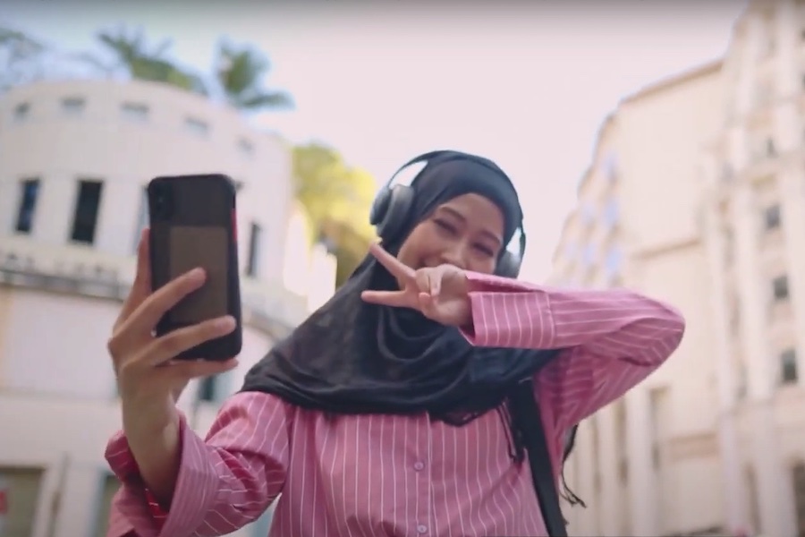 a girl poses for a selfie